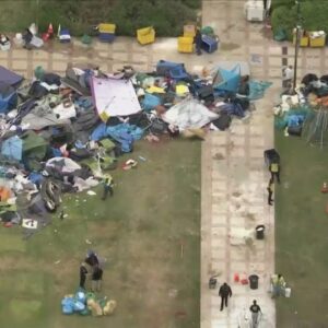 Helicopter footage shows remnants of UCLA protest encampment, trash, graffiti