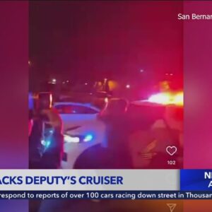 Video shows Southern California street mob attack deputy's cruiser