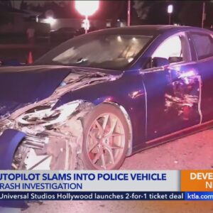 Tesla in self-drive mode slams into police car responding to fatal crash