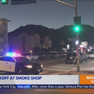 SWAT team responds to armed standoff at smoke shop in San Fernando Valley 