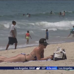 Angelenos hit the beach to cool down from sweltering heat wave