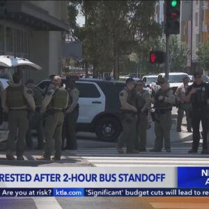 Armed man arrested after 2-hour Metro bus standoff