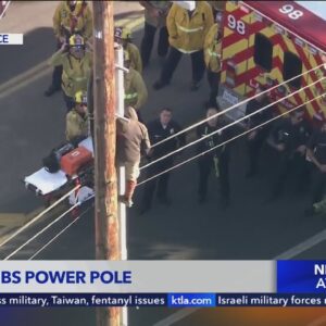 Man scales utility pole in San Fernando Valley