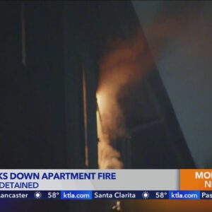 Person detained after fire erupts in Van Nuys apartment