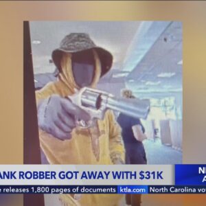 Authorities search for armed suspect in Orange County bank robbery