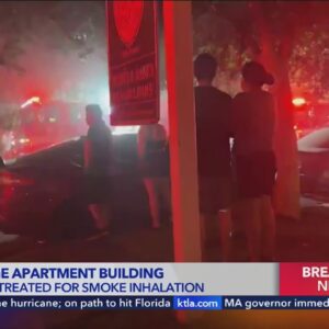 2 hospitalized, including child, after fire rips through Van Nuys apartment building 