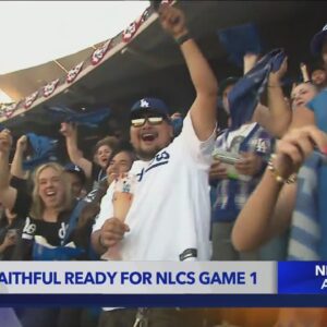 Los Angeles Dodgers fans celebrate the start of NLCS Game 1