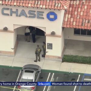 Authorities searching for armed man who robbed bank, prompted school lockdown in Orange County