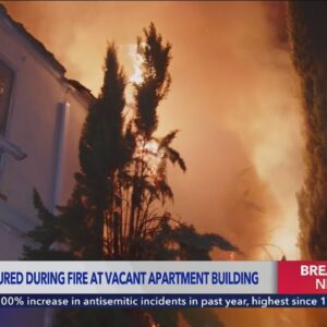 Firefighter falls through floor while battling Hollywood apartment blaze