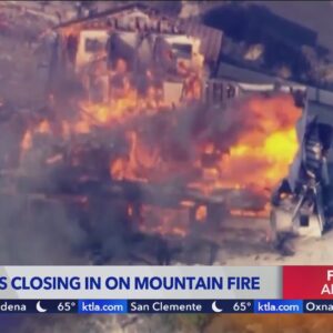 Fire crews closing in on Mountain Fire