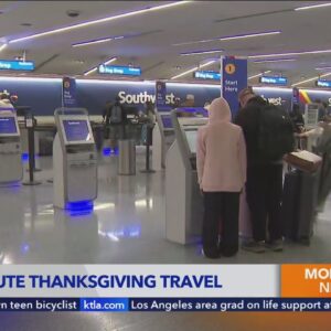 Last-second travelers cruise through LAX on Thanksgiving Day