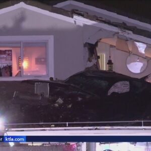 'It's just devastating': Southern California home heavily damaged after car lands on balcony