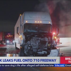 Crews shut down L.A. freeway to clean up fuel spill caused by big rig crash 