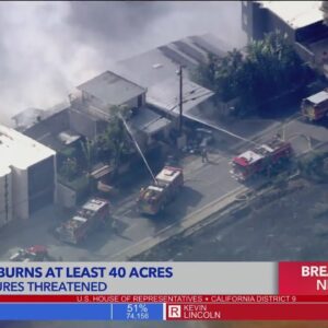 Wildfire burns at least 1 home in Malibu amid gusty Santa Ana winds