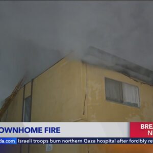 Woman dead, 3 others hospitalized after Panorama City townhomes burst into flames