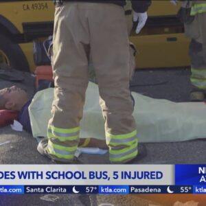 5 injured when SUV hits school bus in Orange County