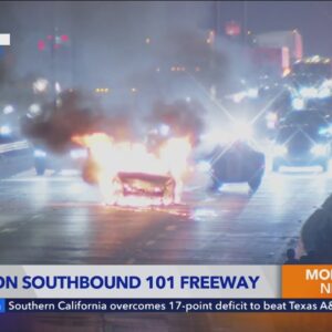 Car catches fire on busy downtown Los Angeles freeway