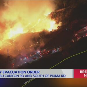 Franklin Fire jumps Malibu Canyon Road, spans west