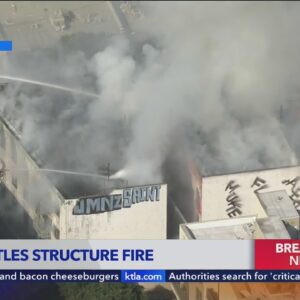 Homeless flee structure fire in downtown Los Angeles