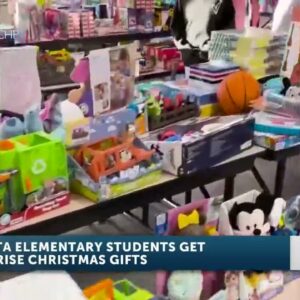 Santa Maria CHP gives Christmas presents to Bonita Elementary Students